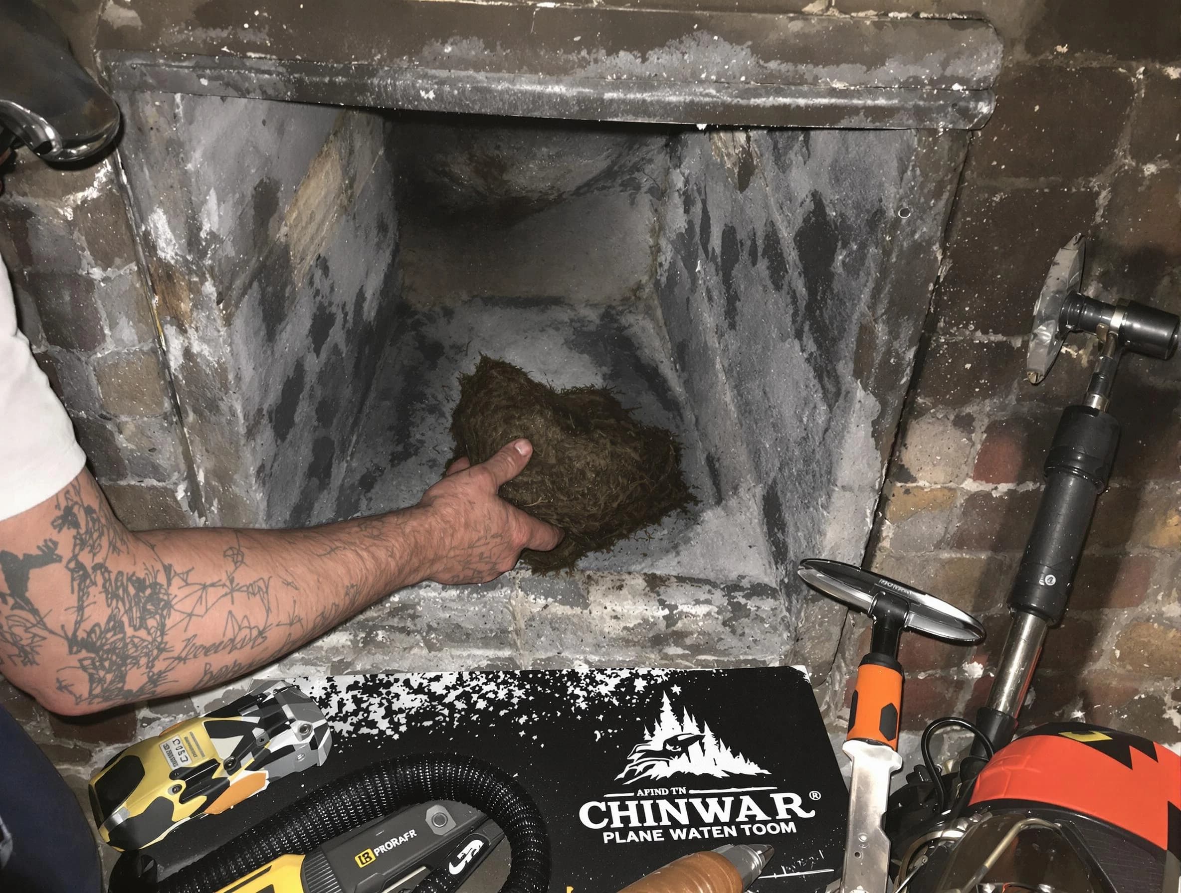 Innsbrook Chimney Sweep safely removing debris and screening chimney in Innsbrook, VA